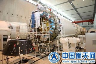 Long March booster being readied to support China's next mooncraft takeoff this month, dedicated to testing technology for future lunar sample-return mission.