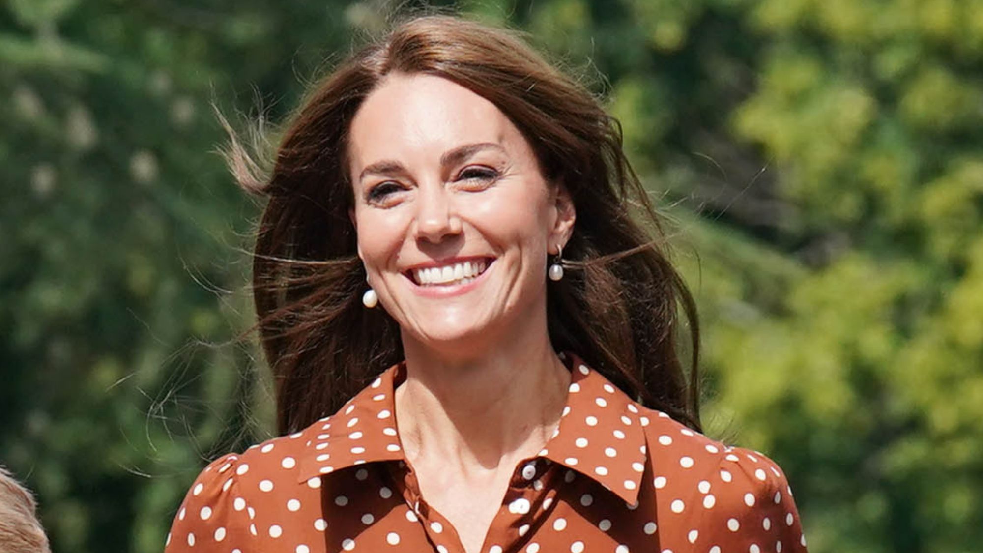 Catherine, Princess of Wales smiles as she accompanies George, Charlotte and Louis (not pictured) to a settling in afternoon at Lambrook School on September 7, 2022
