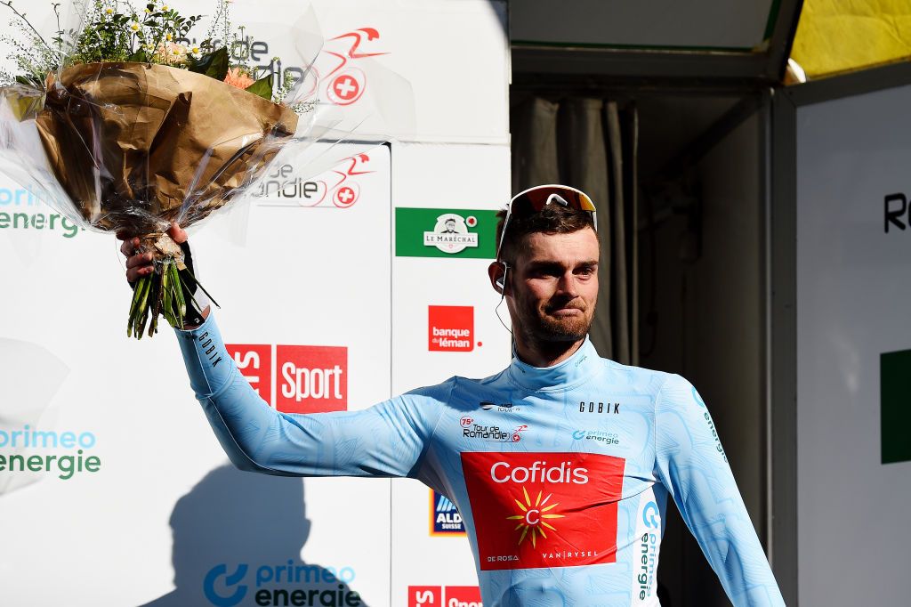 ROMONT SWITZERLAND APRIL 27 Thomas Champion of France and Team Cofidis celebrates winning the blue mountain jersey on the podium ceremony after the 75th Tour De Romandie 2022 Stage 1 a 178km stage from La Grande Beroche to Romont 777m TDR2022 on April 27 2022 in Romont Switzerland Photo by Dario BelingheriGetty Images