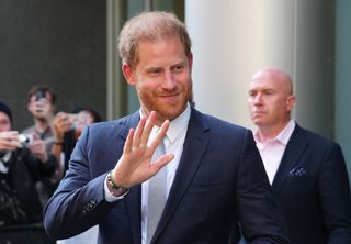 Prince Harry leaving High Court in the U.K. this week, waving