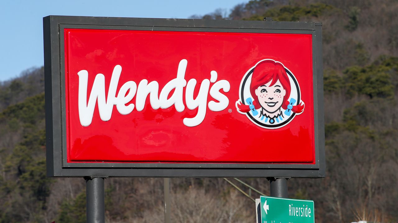 sign for Wendy&#039;s fast-casual restaurant