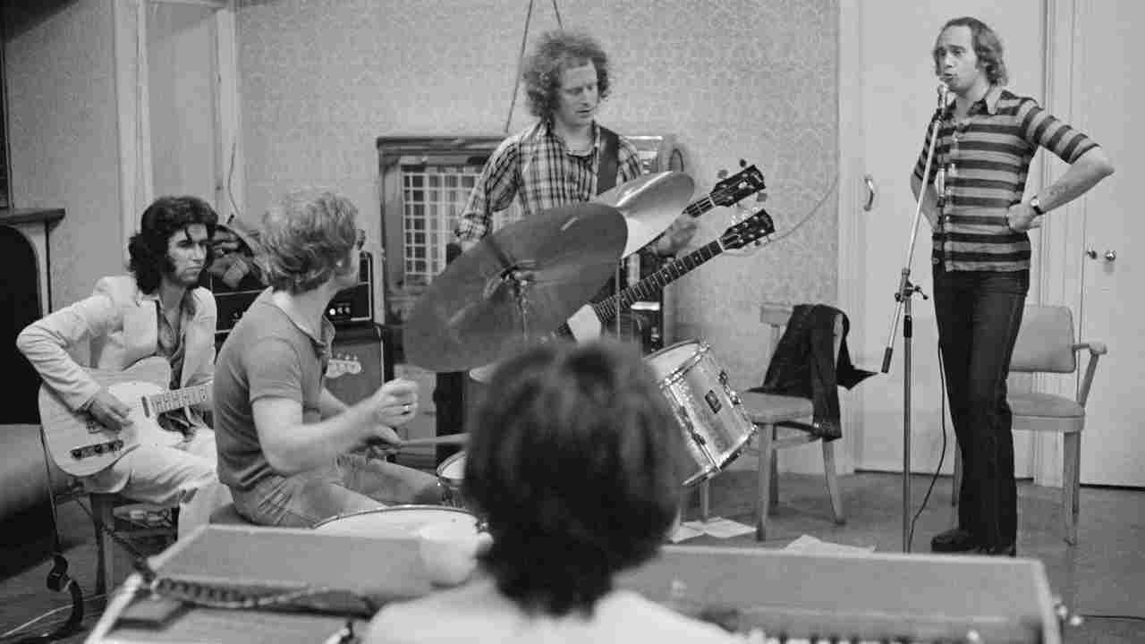 Family posing for a photograph in the recording studio in 1972