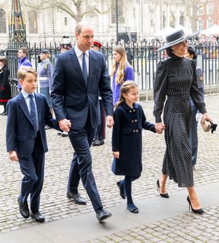 Prince George of Cambridge, Prince William, Duke of Cambridge, Princess Charlotte of Cambridge and Catherine, Duchess of Cambridge depart the memorial service for the Duke Of Edinburgh