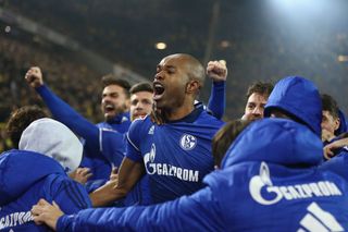 Schalke players celebrate their fourth goal after coming from 4-0 down to draw 4-4 against Borussia Dortmund in November 2017.