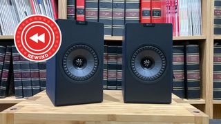 KEF speakers on table with Rewind logo