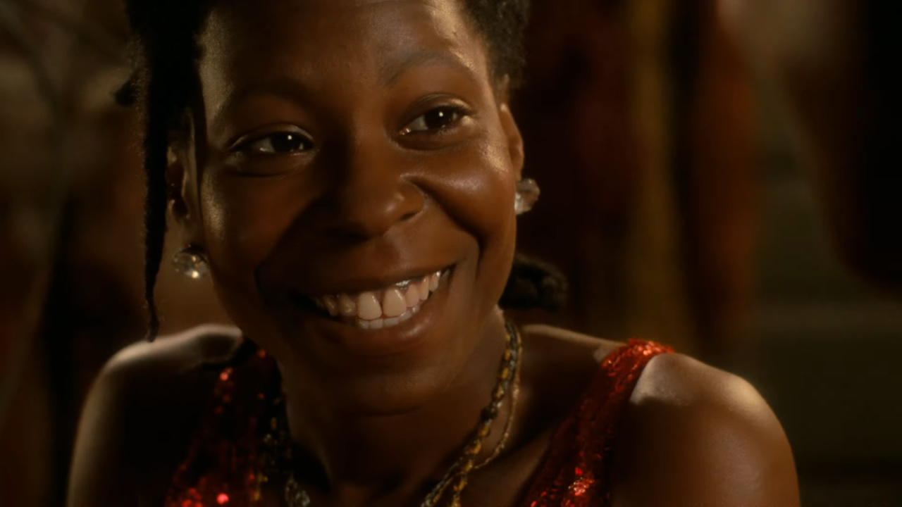Whoopi Goldberg smiling in The Color Purple.