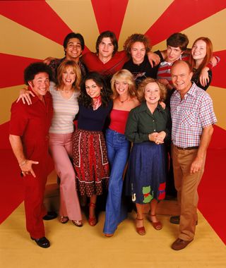 That 70's show cast, Tanya Roberts pictured bottom row, second person on the left
