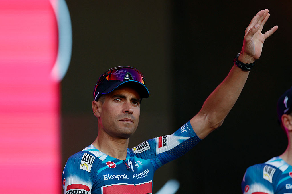 Soudal Quick-Step's Spanish rider Mikel Landa waves on stage during the opening ceremony and team presentation in Tirana, on May 7, 2025, two days before the departure of the Giro d'Italia 2025 cycling race. The Giro d'Italia 2025 cycling race will depart from Durres, Albania on May 9, and finish in Rome on June 1. (Photo by Luca Bettini / AFP)