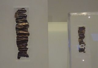 The scrolls found in Ketef Hinom, as displayed in the Israel Museum