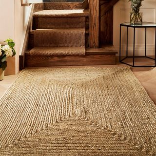 Large jute rug in hallway