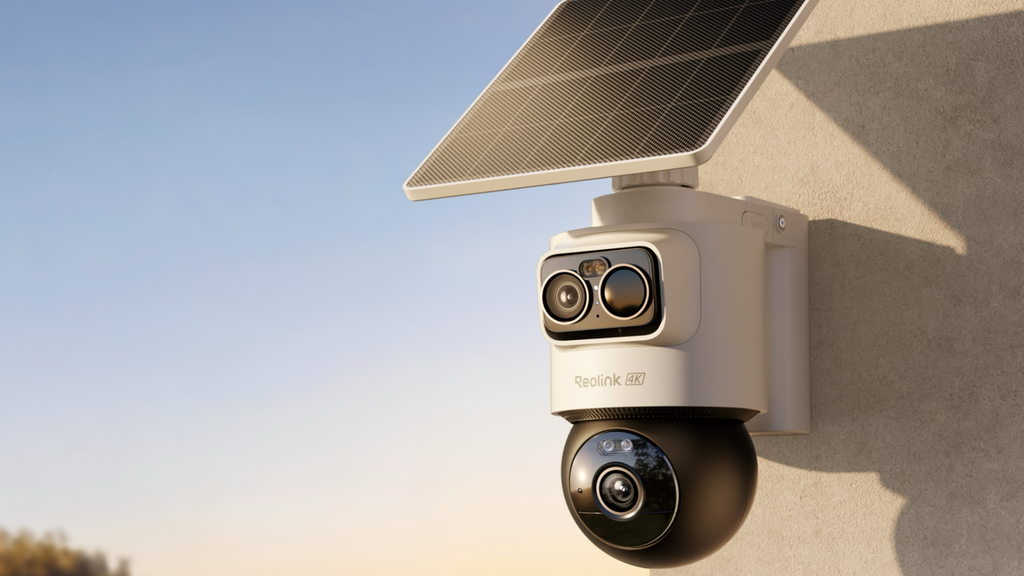 Reolink OMVI Ultra affixed to a wall with a solar panel attached on top