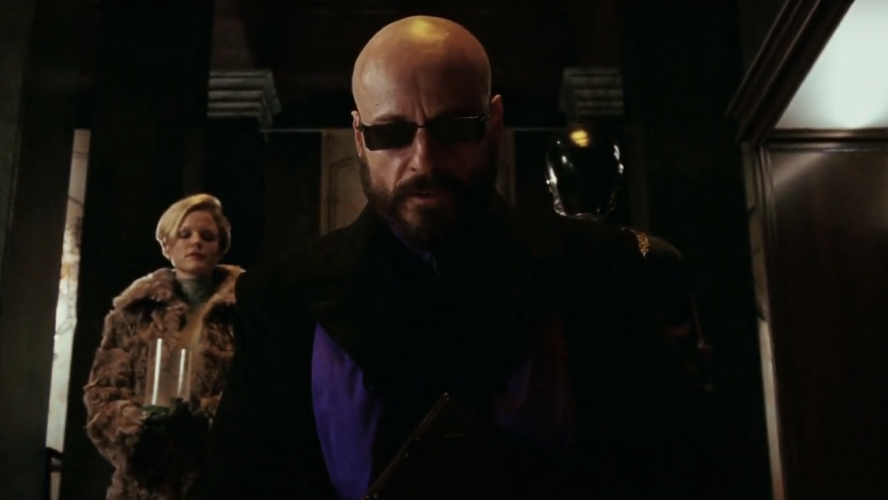 Karel Roden as Grigori Rasputin wearing sunglasses in Hellboy