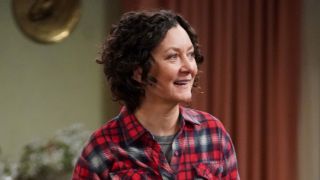 Darlene smiling on The Conners