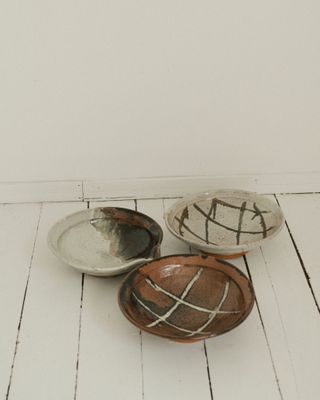 Three glazed clay plates in white and brown by Matt Fishman