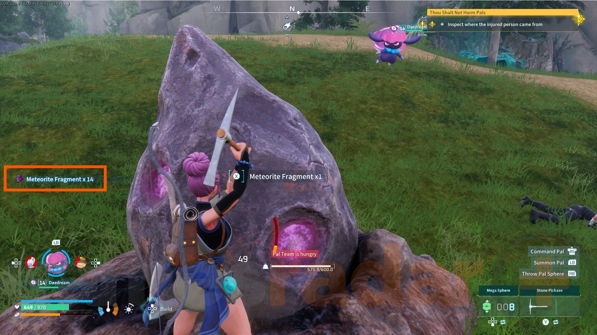 The player character mines a large meteor for Palworld Meteorite Fragments.