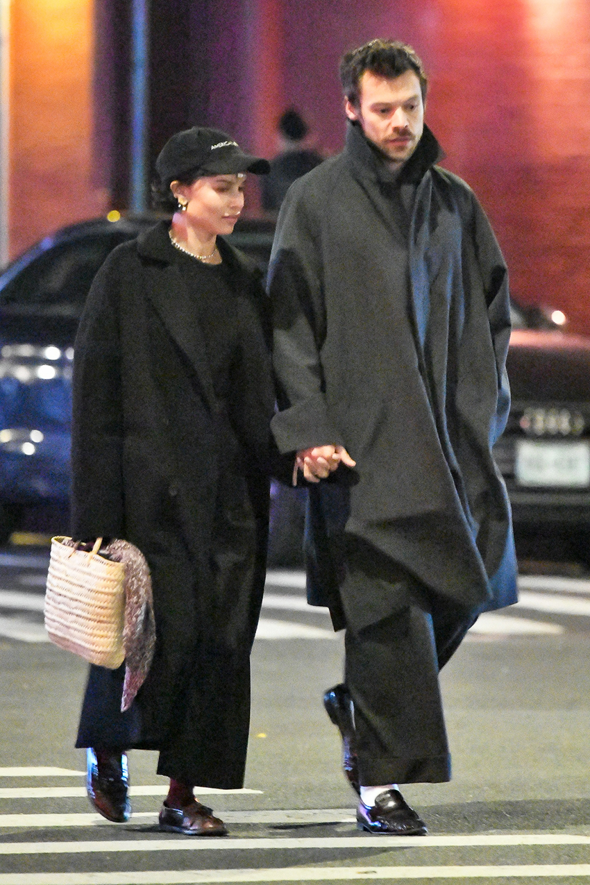 Zoe Kravitz and Harry Styles walking in NYC while wearing coats and loafers