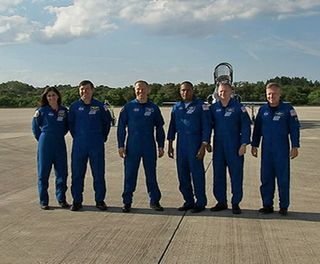 Crew of Space Shuttle Discovery's Final Mission to Stage Launch Rehearsal 