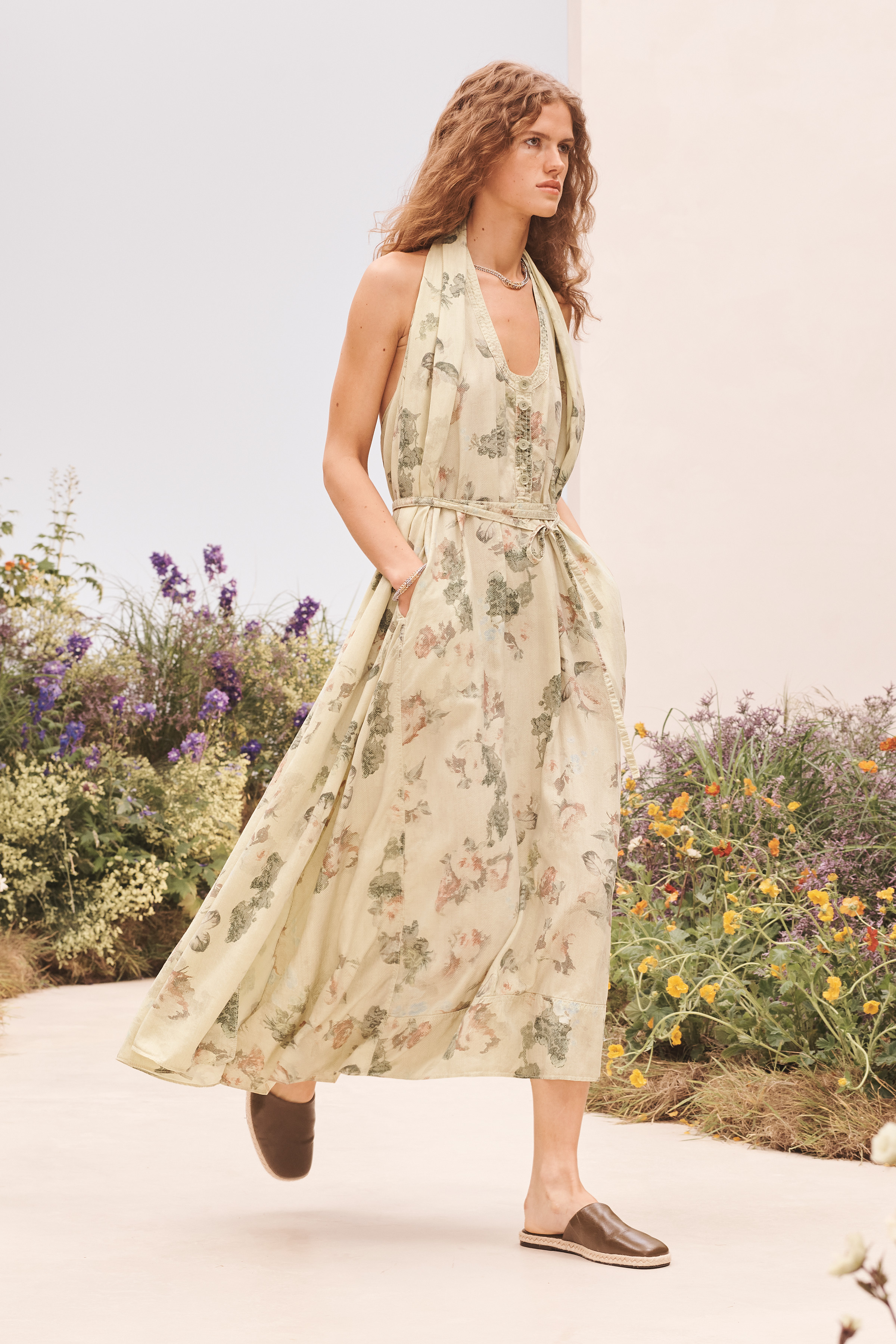 A model wearing a summer outfit from the Zara SRPLS FLWRS fashion collection