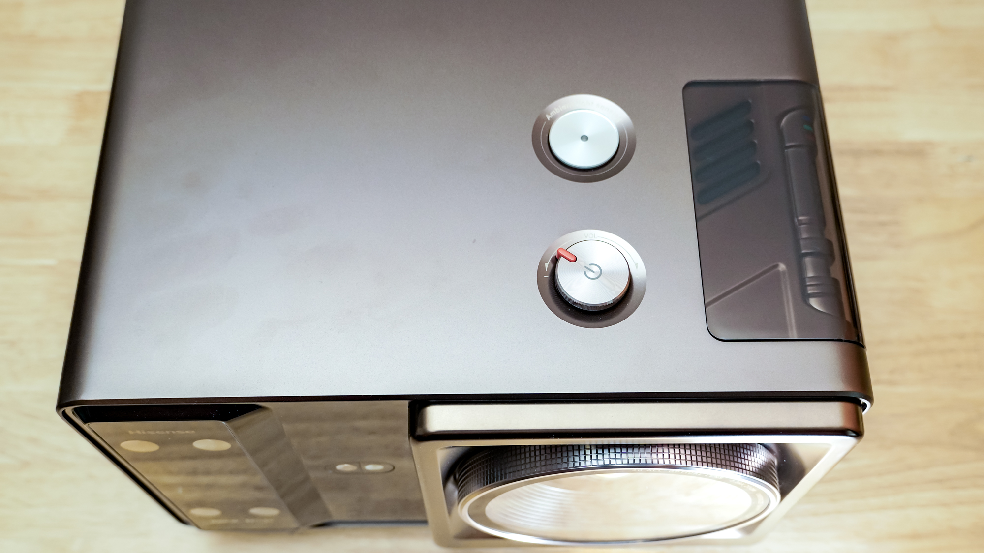 A Hisense XR10 Projector on a table