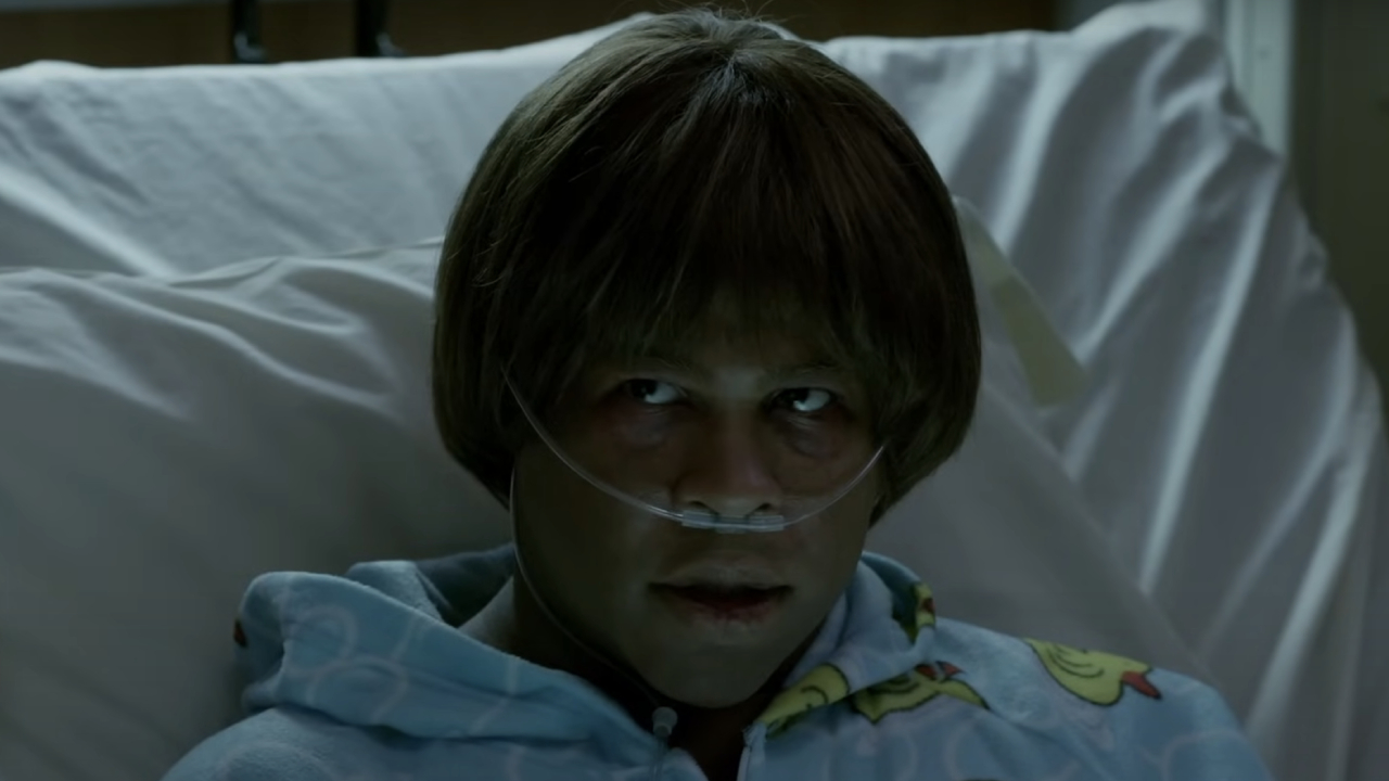 Jordan Peele as Liam looking menacing in his hospital bed on Key & Peele