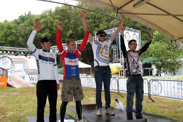 Elite men's podium: 4th - Michael Kochendorfer (Germany); 2nd Jason Miles (Great Britain); 1st - Jason English (Australia); 3rd - Craig Bowles (Great Britain)