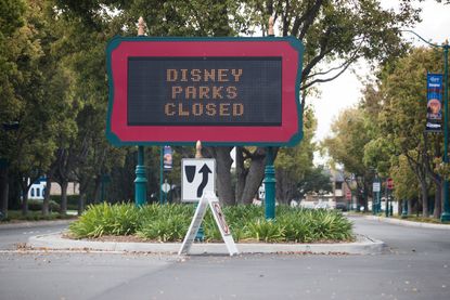 A sign saying Disney parks in Anaheim, California, are closed.