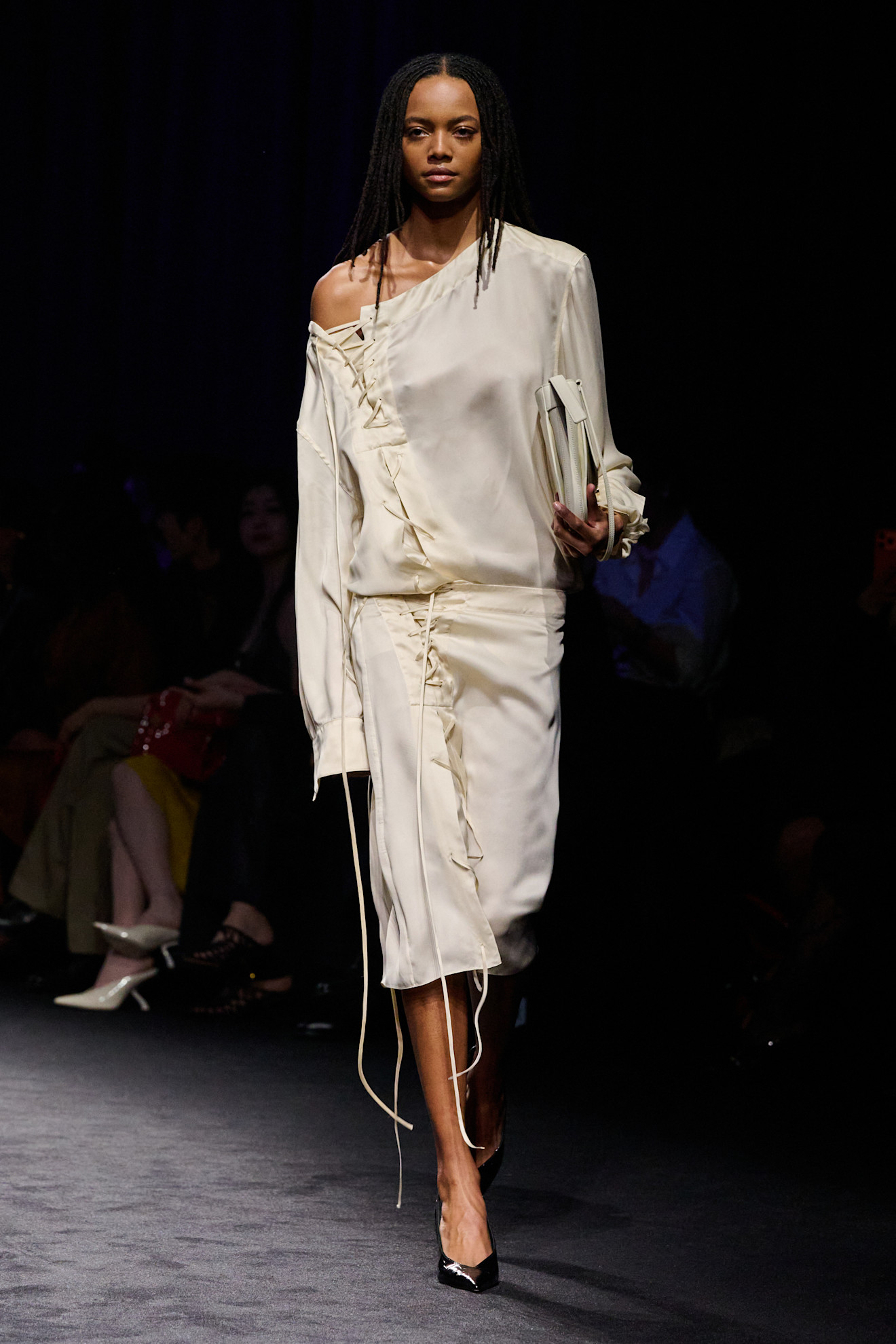 a model walks the ferragamo fall/winter 2026 show.