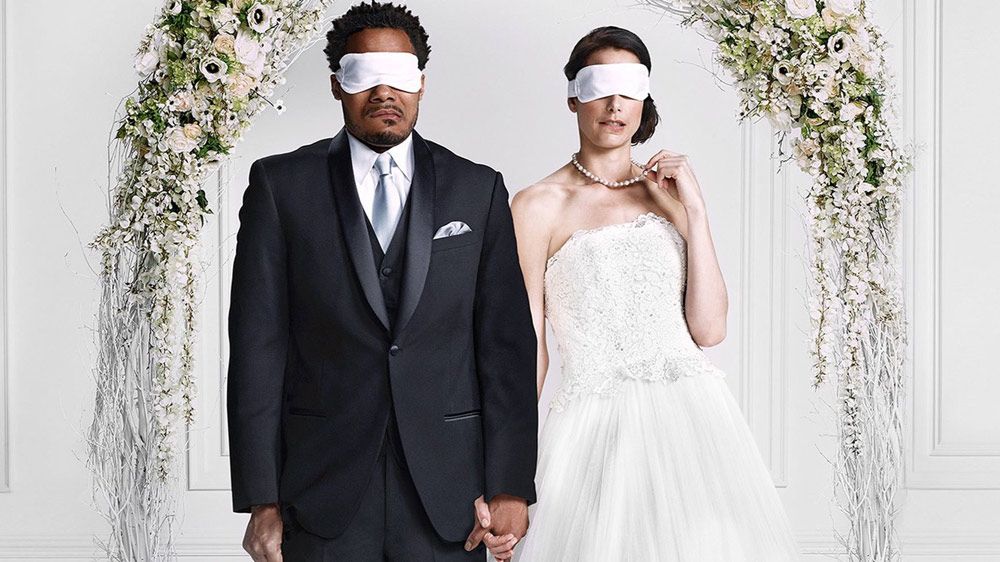 Married at First Sight key art features a blind-folded groom and bride