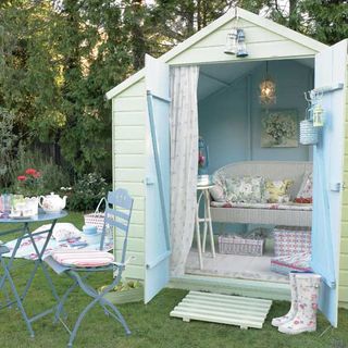 soft green and blue garden shed