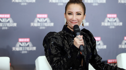 Singer Coco Lee receives interview during rehearsal for 2018 Double 11 Global Shopping Festival on November 10, 2018 in Shanghai, China.