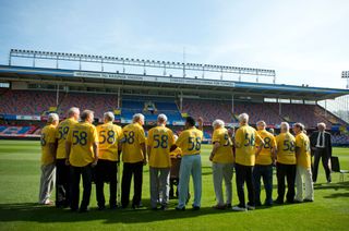 Members of Brazil's 1958 World Cup-winning squad pose at the Rasunda Stadium, scene of that win, ahead of a friendly against Sweden in 2012.