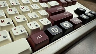 8BitDo Retro Mechanical Keyboard on a wooden floor