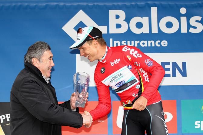 Belgian legend Eddy Merckx presents Tony Martin with the stage winner's trophy