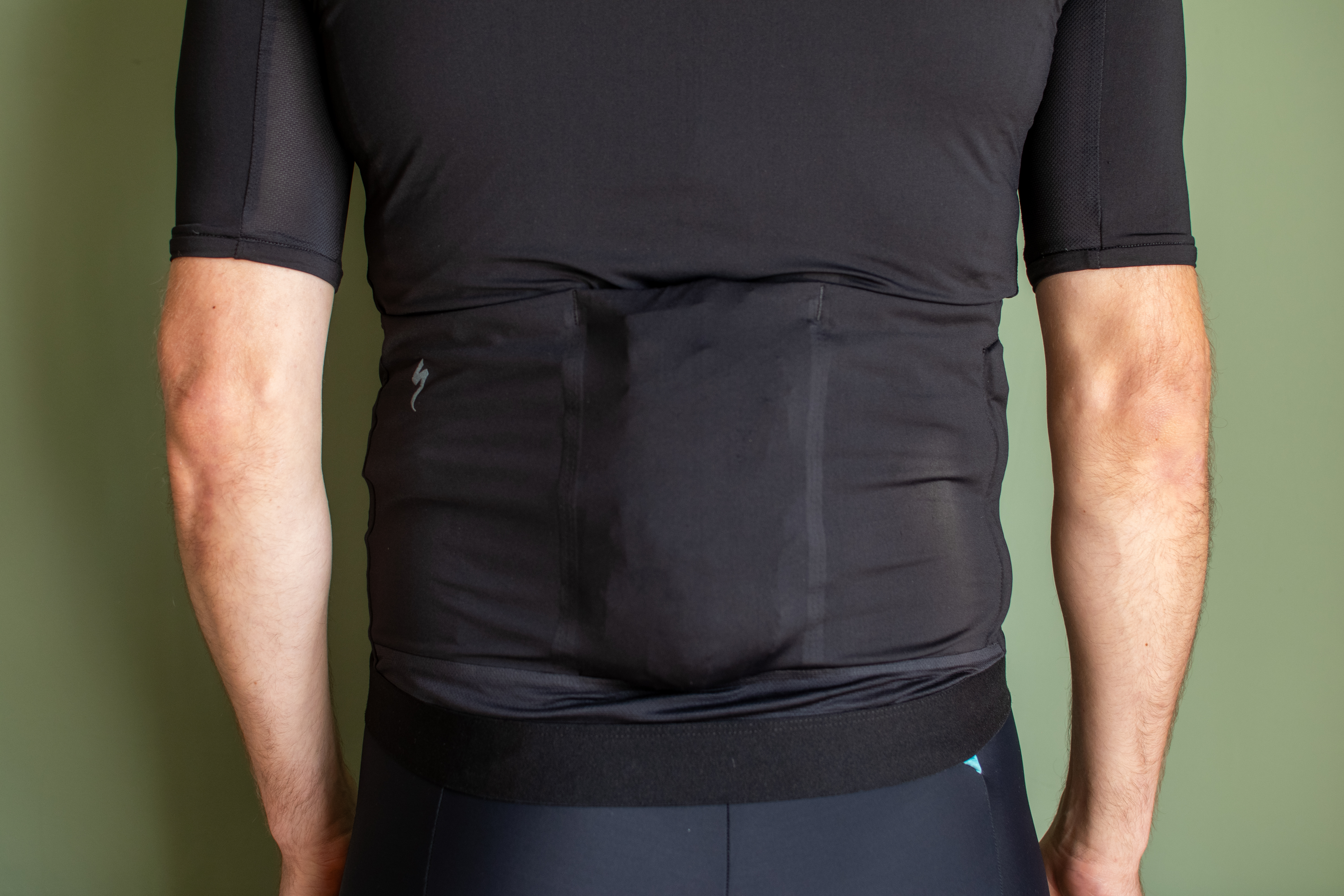 A male rider wearing a black jersey