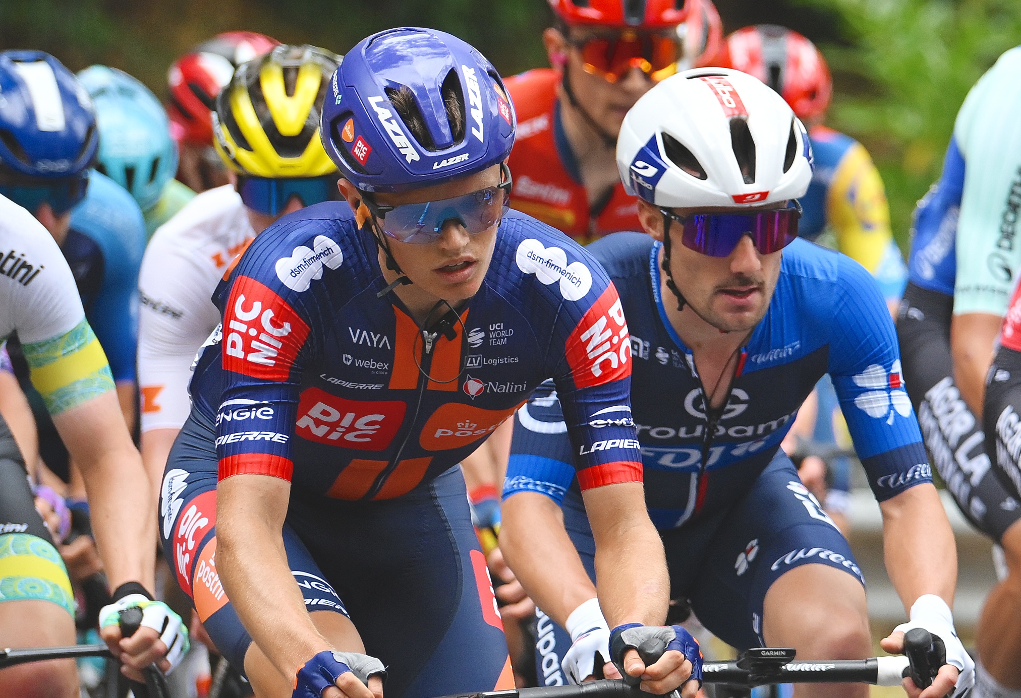 URAIDLA, AUSTRALIA - JANUARY 23: (L-R) Oscar Onley of The United Kingdom and Team Picnic PostNL, Remy Rochas of France and Team Groupama - FDJcompete during the 25th Santos Tour Down Under 2025, Stage 3 a 147.5km stage from Norwood to Uraidla 491m / #UCIWT / on January 22, 2025 in Uraidla, Australia. (Photo by Dario Belingheri/Getty Images)