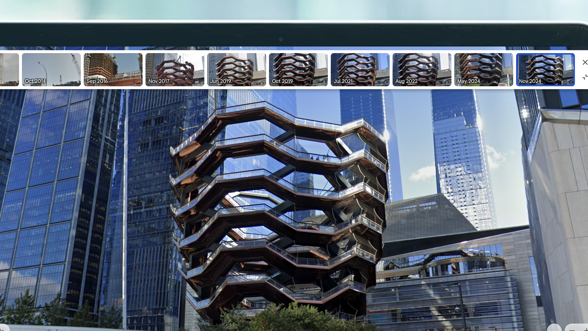 A laptop screen showing a Google Earth historical Street View image of the Vessel building in New York
