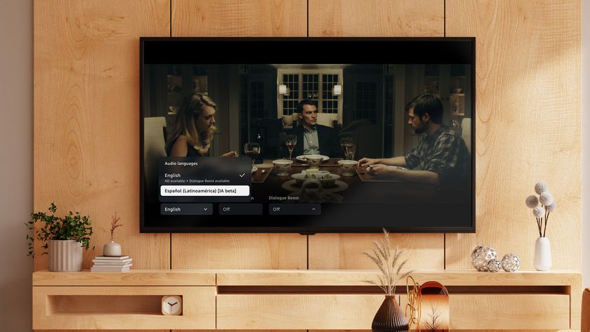 A TV in a living room with the language settings displayed