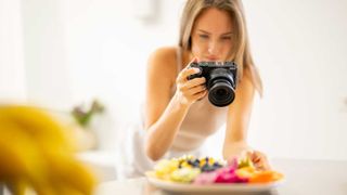 Top 10 Nikon Z lenses - woman using Nikon Z30