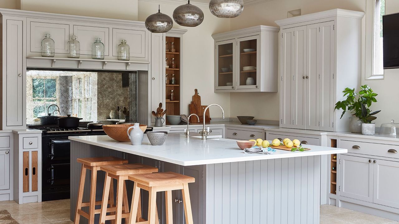 kitchen with white cabinet and mirror