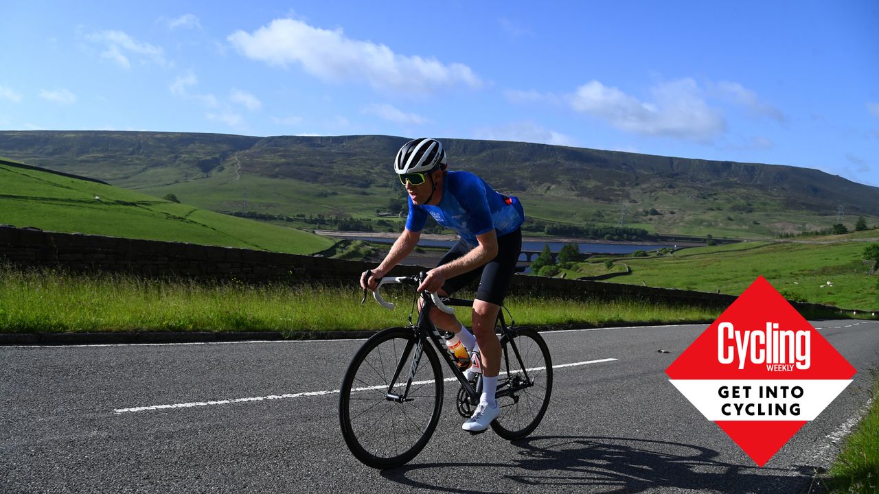 Image shows a cyclist riding a road bike.