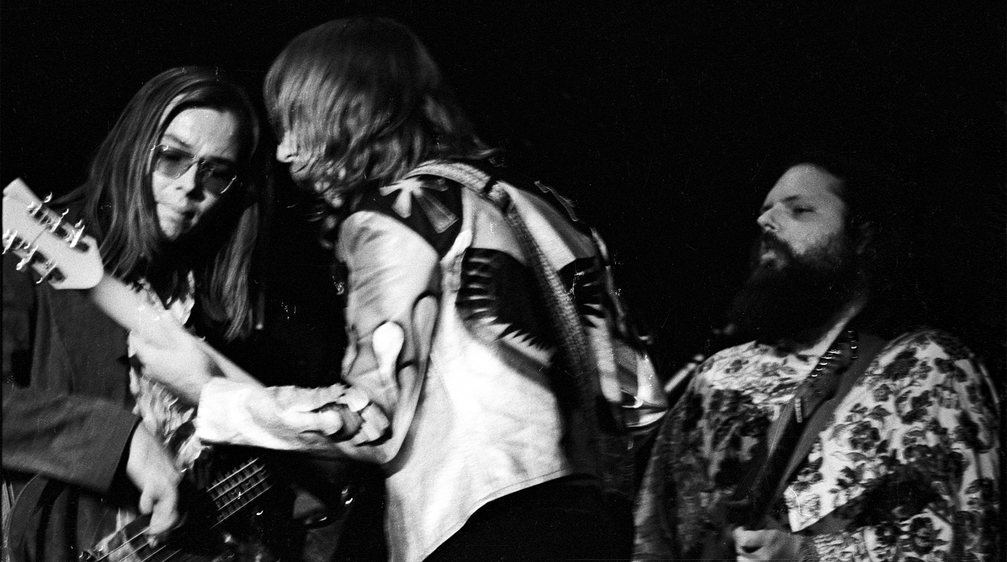 Bassist Walter Becker, guitarist Jeff "Skunk" Baxter and guitarist Denny Dias of the rock and roll band "Steely Dan" perform onstage in 1973.