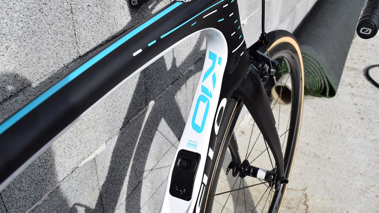 The black and white frameset has constrasting electric blue decals