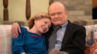 Debra Jo Rupp and Kurtwood Smith seated next to each other on couch in That '90s Show