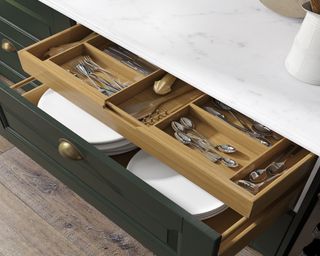 Kitchen drawers with plates and cutlery