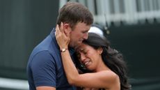 Steven Fisk and his wife emotionally embrace after his win at the 2025 Sanderson Farms Championship