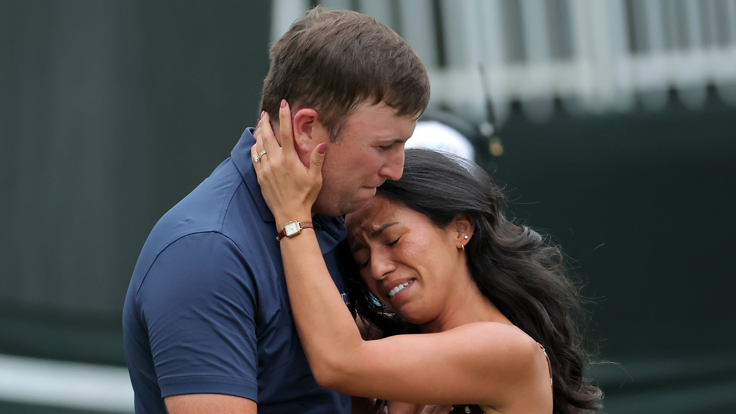 Steven Fisk and his wife emotionally embrace after his win at the 2025 Sanderson Farms Championship