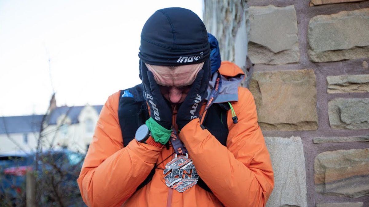 Jack Scott just having crossed the finishing line of the 2024 Spine Race