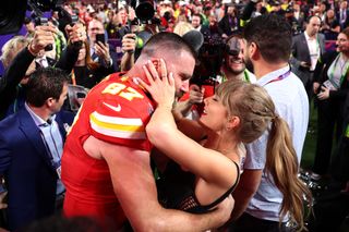 Travis Kelce #87 of the Kansas City Chiefs celebrates with Taylor Swift after defeating the San Francisco 49ers 2 during Super Bowl LVIII.