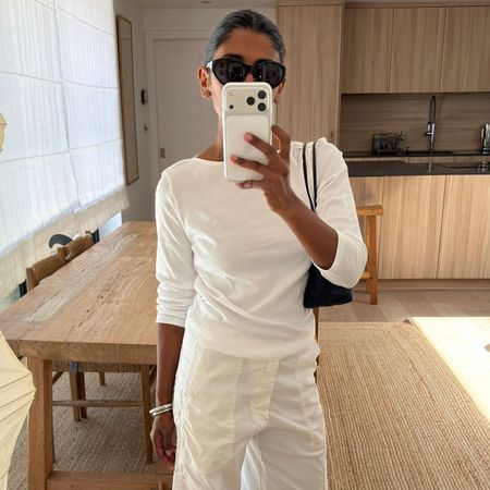 Woman in a white top and pants