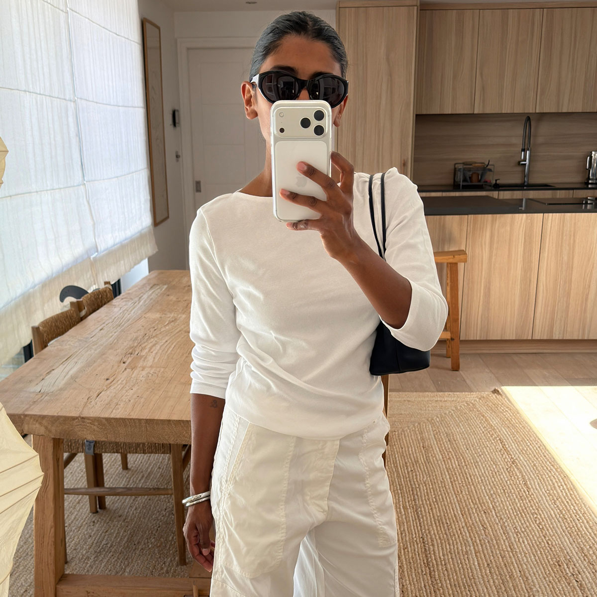Woman in a white top and pants